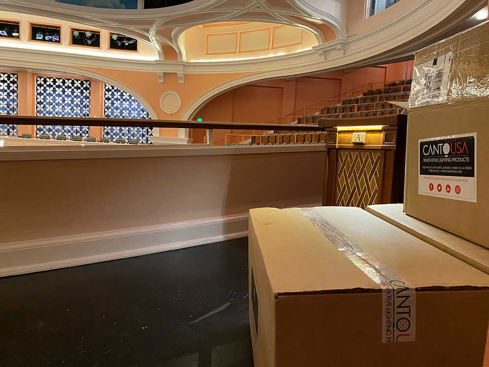 Boxed Canto USA RETRO Series lighting components staged inside the Charleston Gaillard Center performance hall