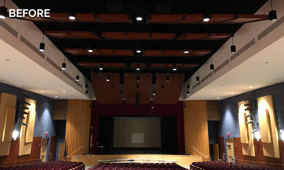 Before view of Penn’s Grove Middle School auditorium with dimmer house lighting near the stage